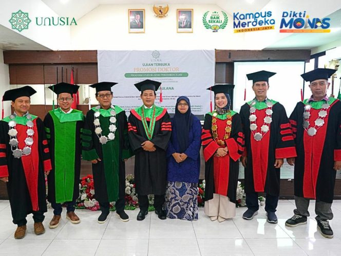 Pengurus Cabang Nahdlatul Ulama, Ramlan Maulana saat sidang Promosi Doktor di Unisia. (Dok. Istimewa)